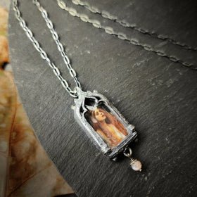 the broad stream bore her far away - venetian gothic window amulet