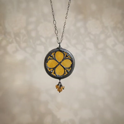 the infinity of the hive - floriated clover miracle window amulet