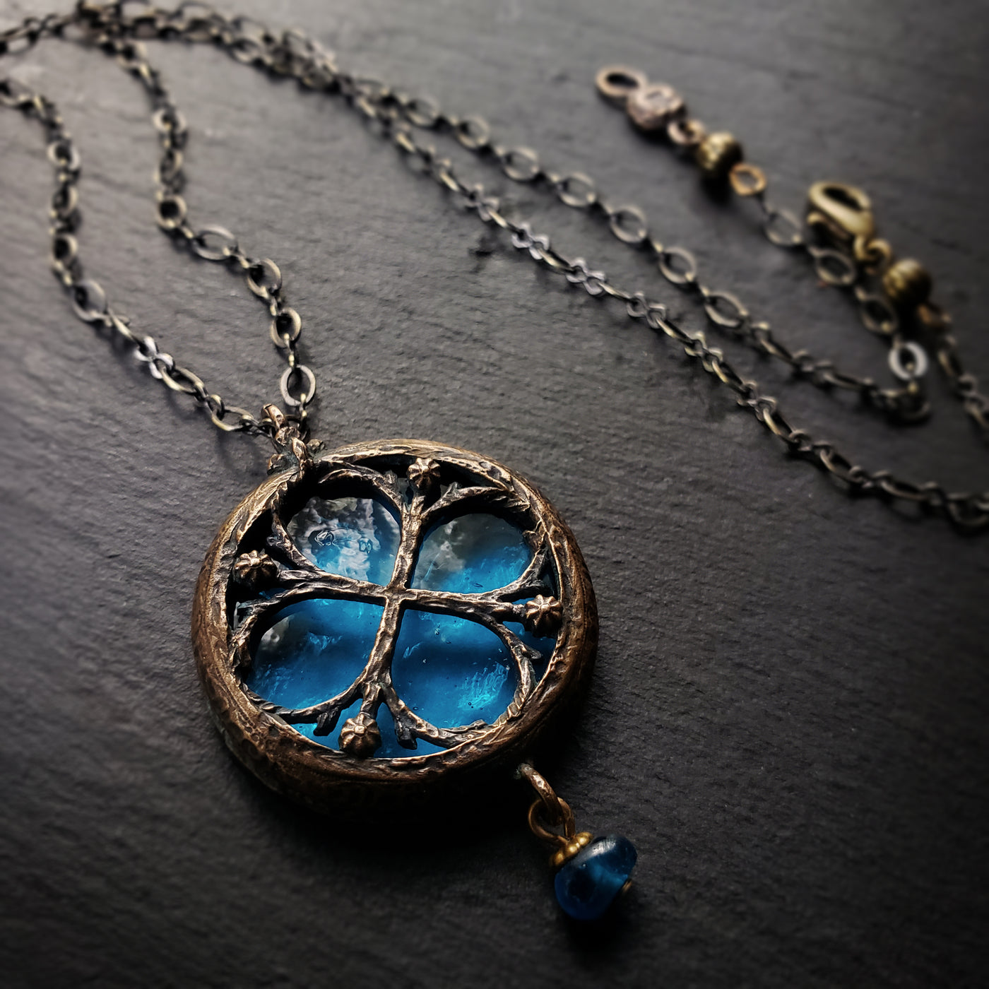 halcyon - floriated clover miracle window amulet