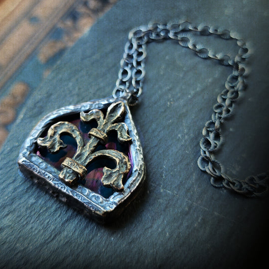 fleur de lis - iridescent aqua arch window amulet - antiqued sterling & bronze