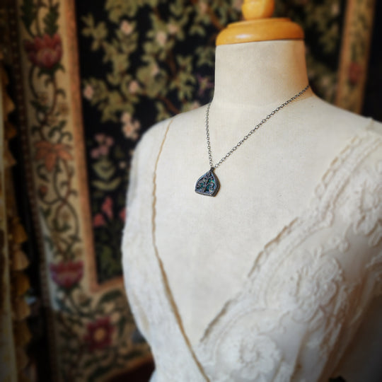 fleur de lis - iridescent aqua arch window amulet - antiqued sterling & bronze