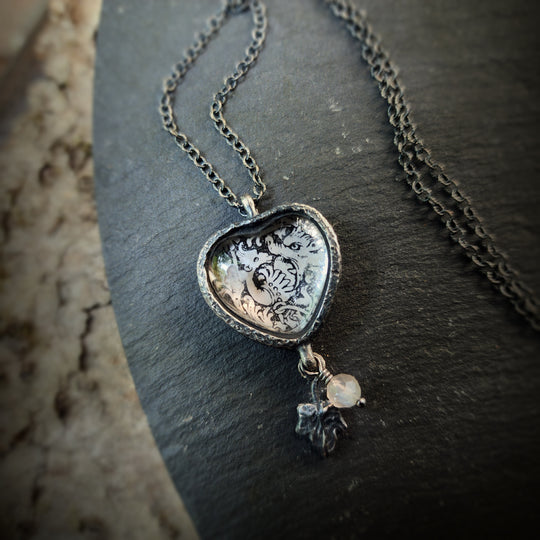 beasties & birds - pictorial heart amulet