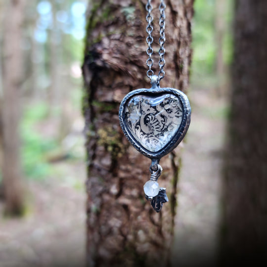 beasties & birds - pictorial heart amulet