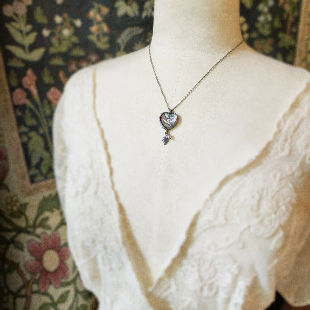 beasties & birds - pictorial heart amulet