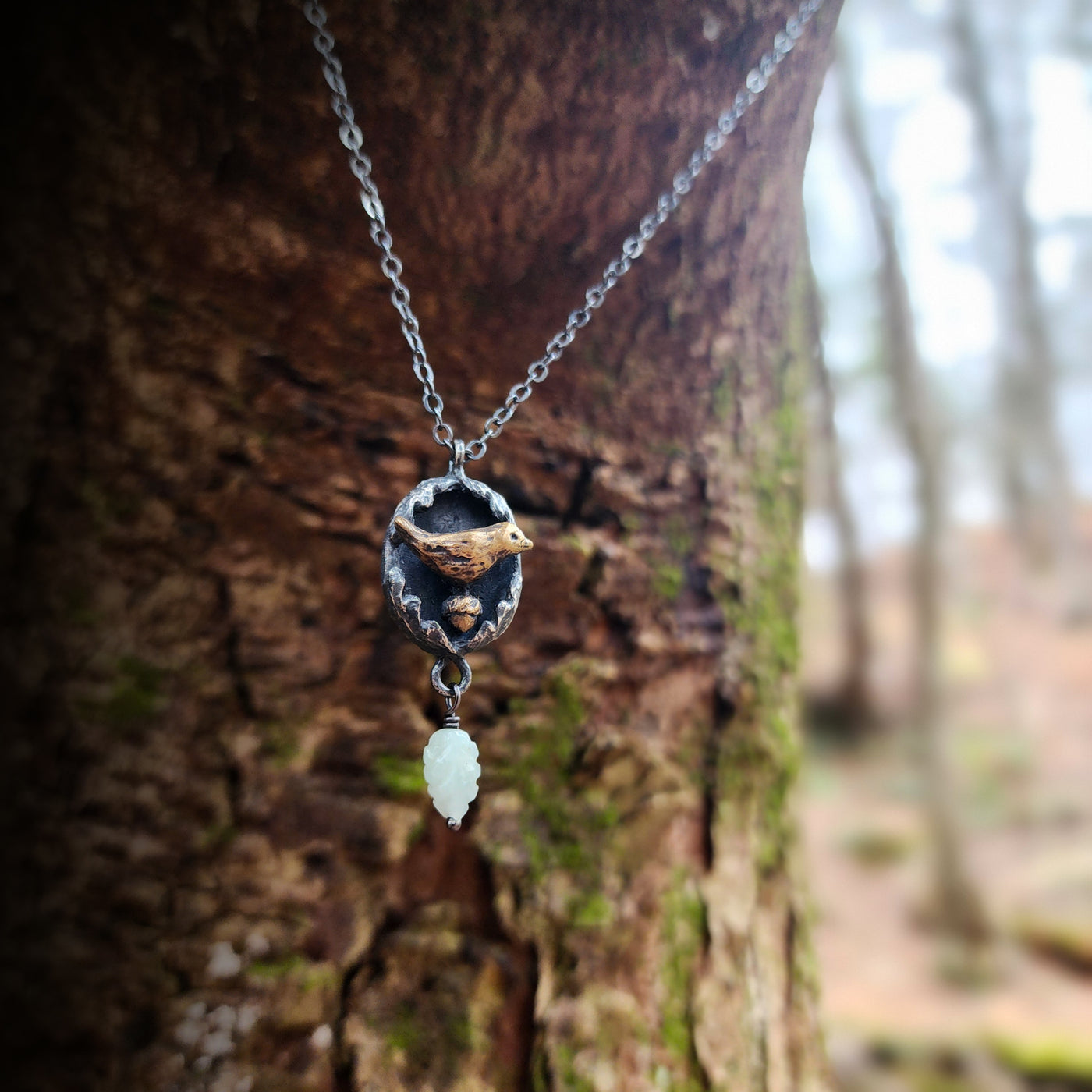 protect nature - bird & acorn amulet