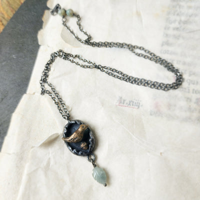 protect nature - bird & acorn amulet