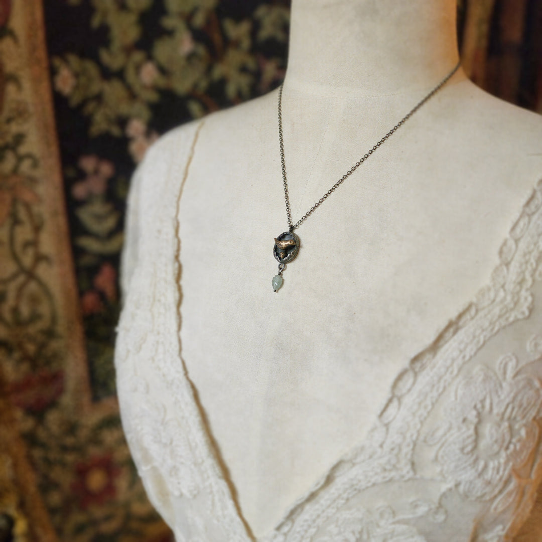 protect nature - bird & acorn amulet