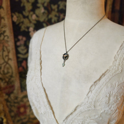 protect nature - bird & acorn amulet