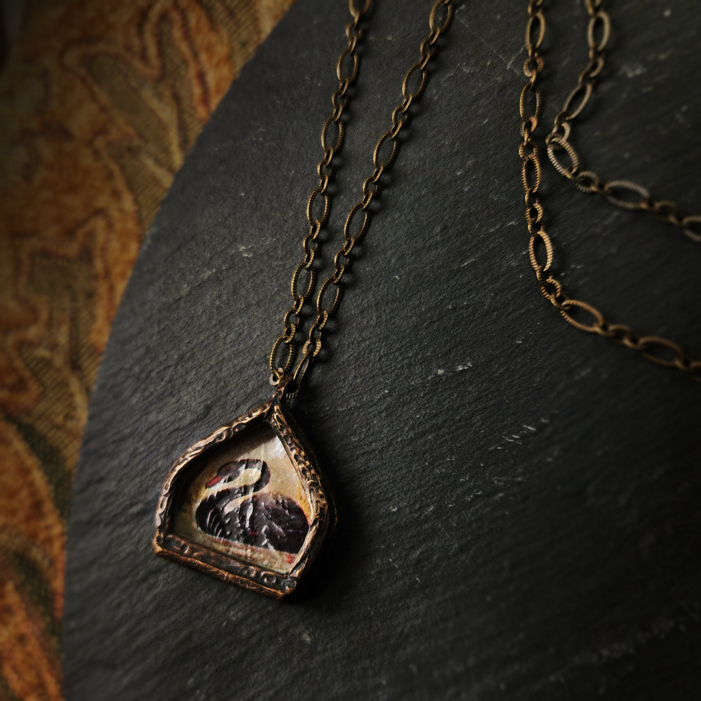 the black swan - pictorial arch amulet
