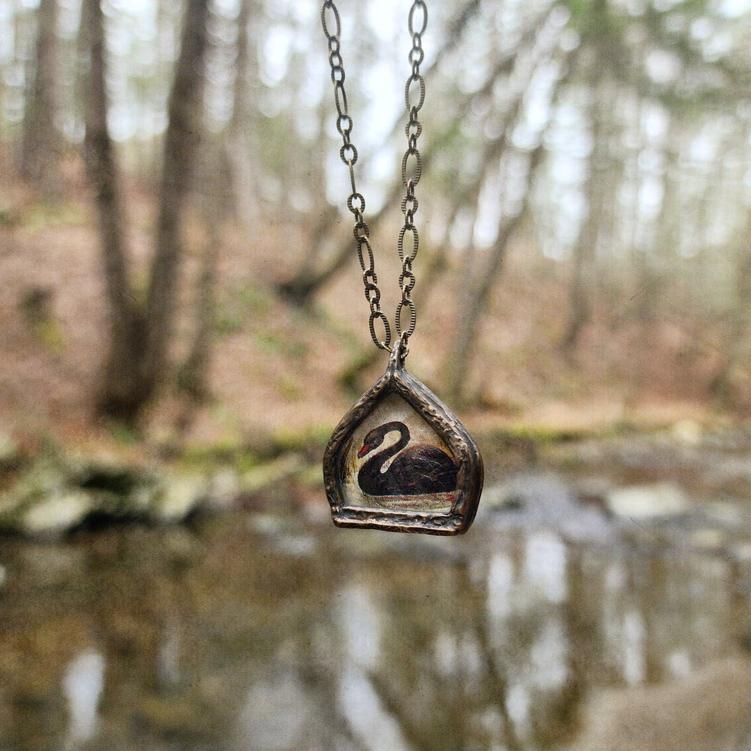 the black swan - pictorial arch amulet