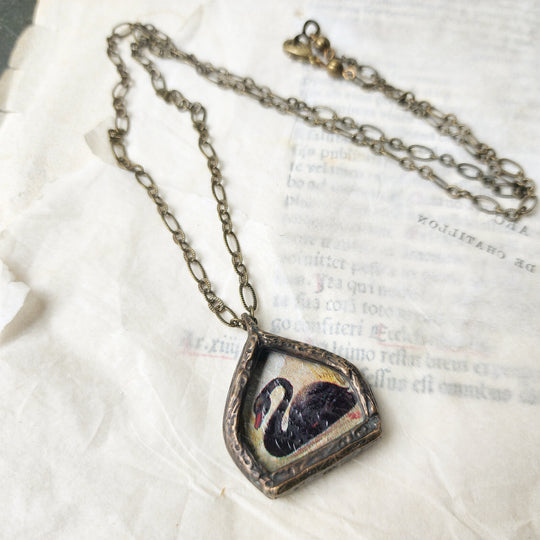 the black swan - pictorial arch amulet