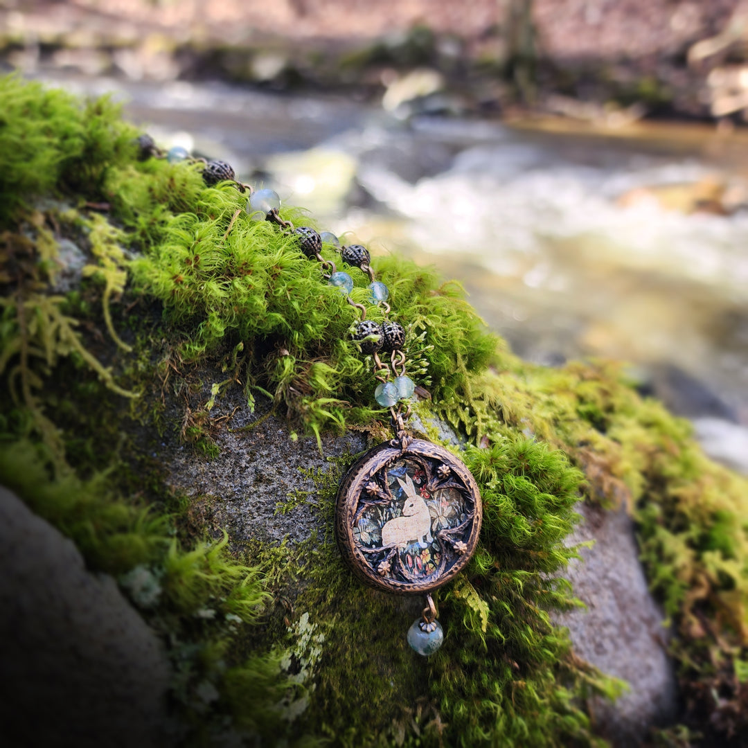 tapestry rabbit - floriated clover miracle window amulet