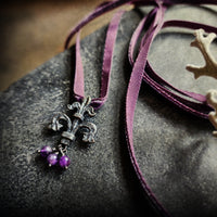 fleur de lis amulet - antiqued sterling on velvet