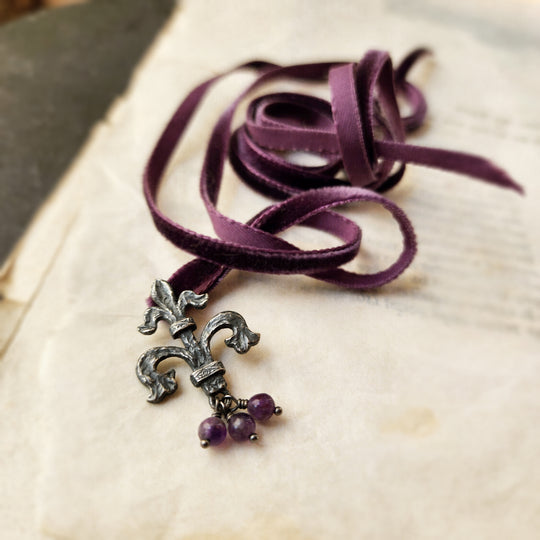 fleur de lis amulet - antiqued sterling on velvet