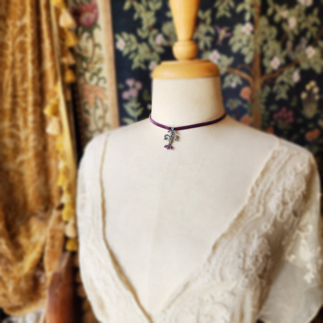 fleur de lis amulet - antiqued sterling on velvet