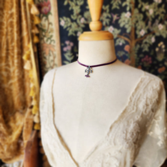 fleur de lis amulet - antiqued sterling on velvet