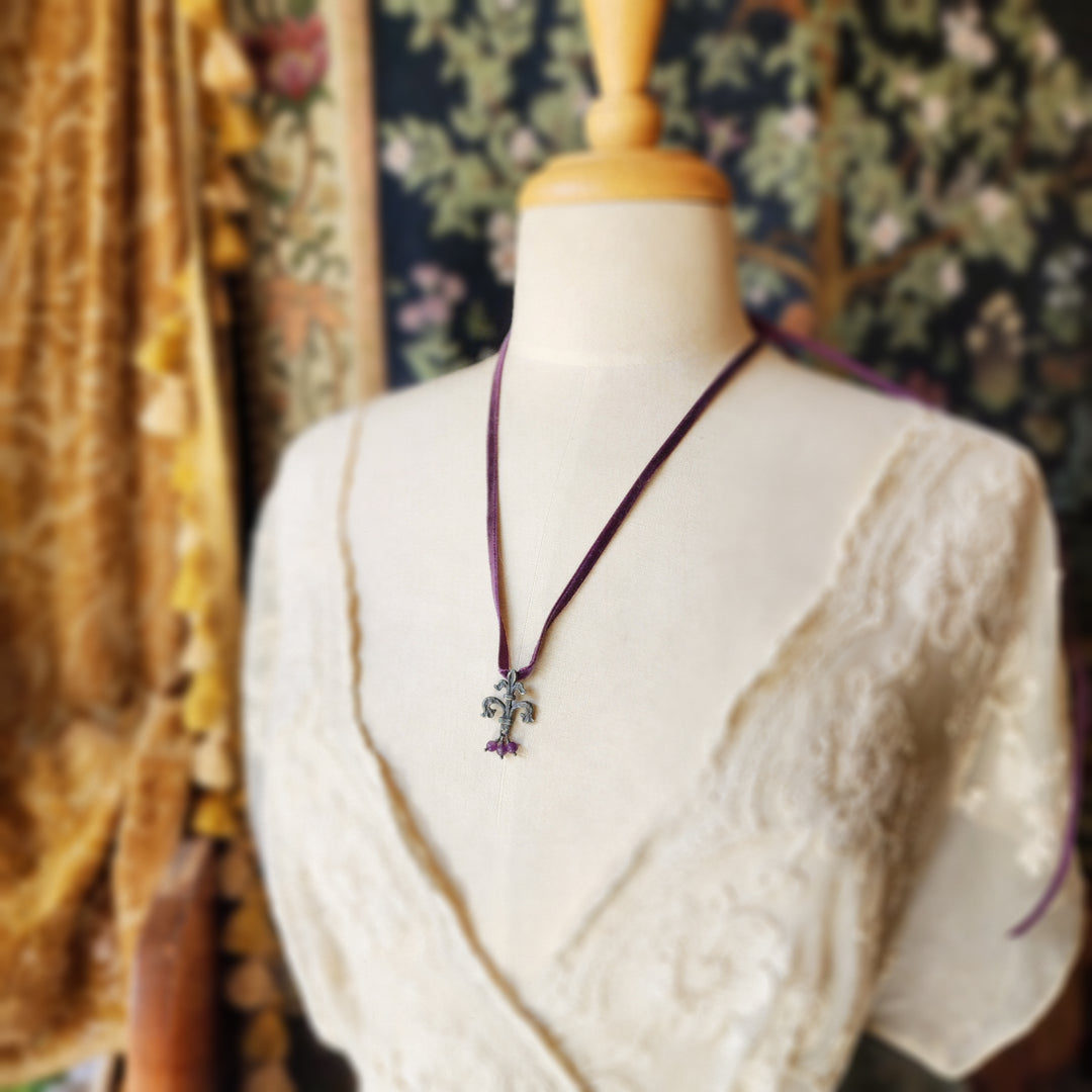 fleur de lis amulet - antiqued sterling on velvet