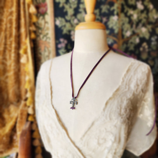 fleur de lis amulet - antiqued sterling on velvet