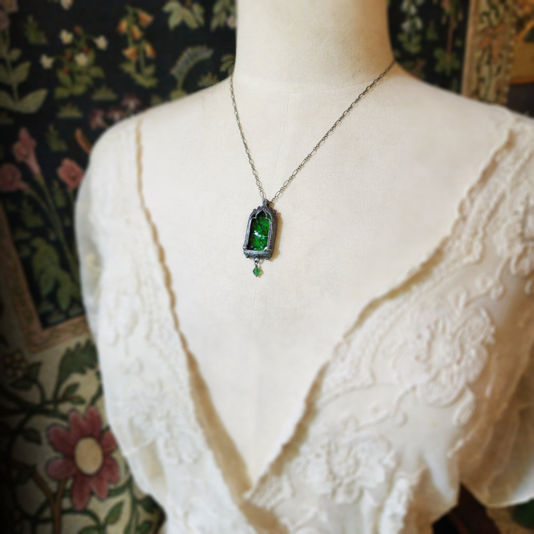the green king - venetian gothic window amulet