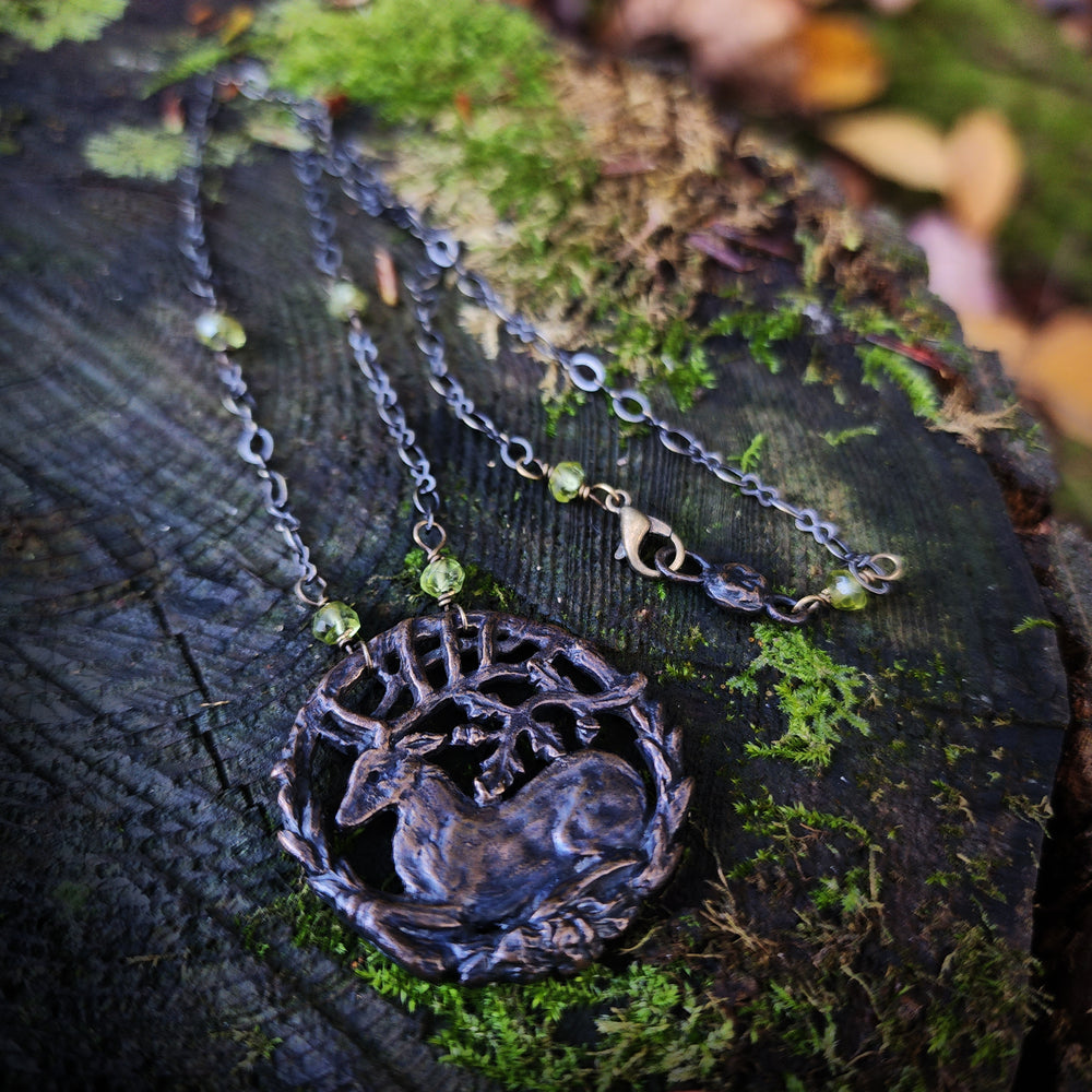 hart of the oak bower amulet - bronze & faceted peridot