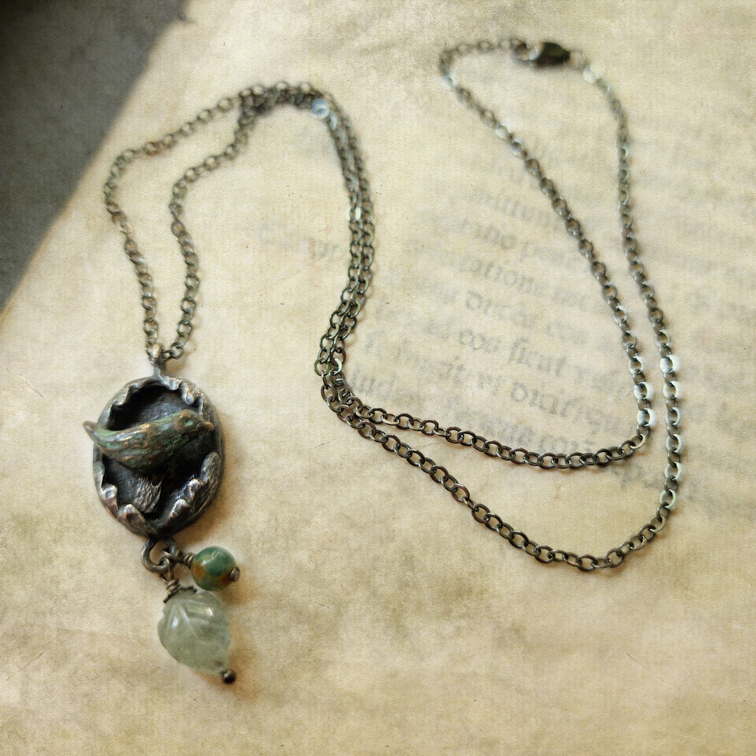 hope is the thing with feathers amulet