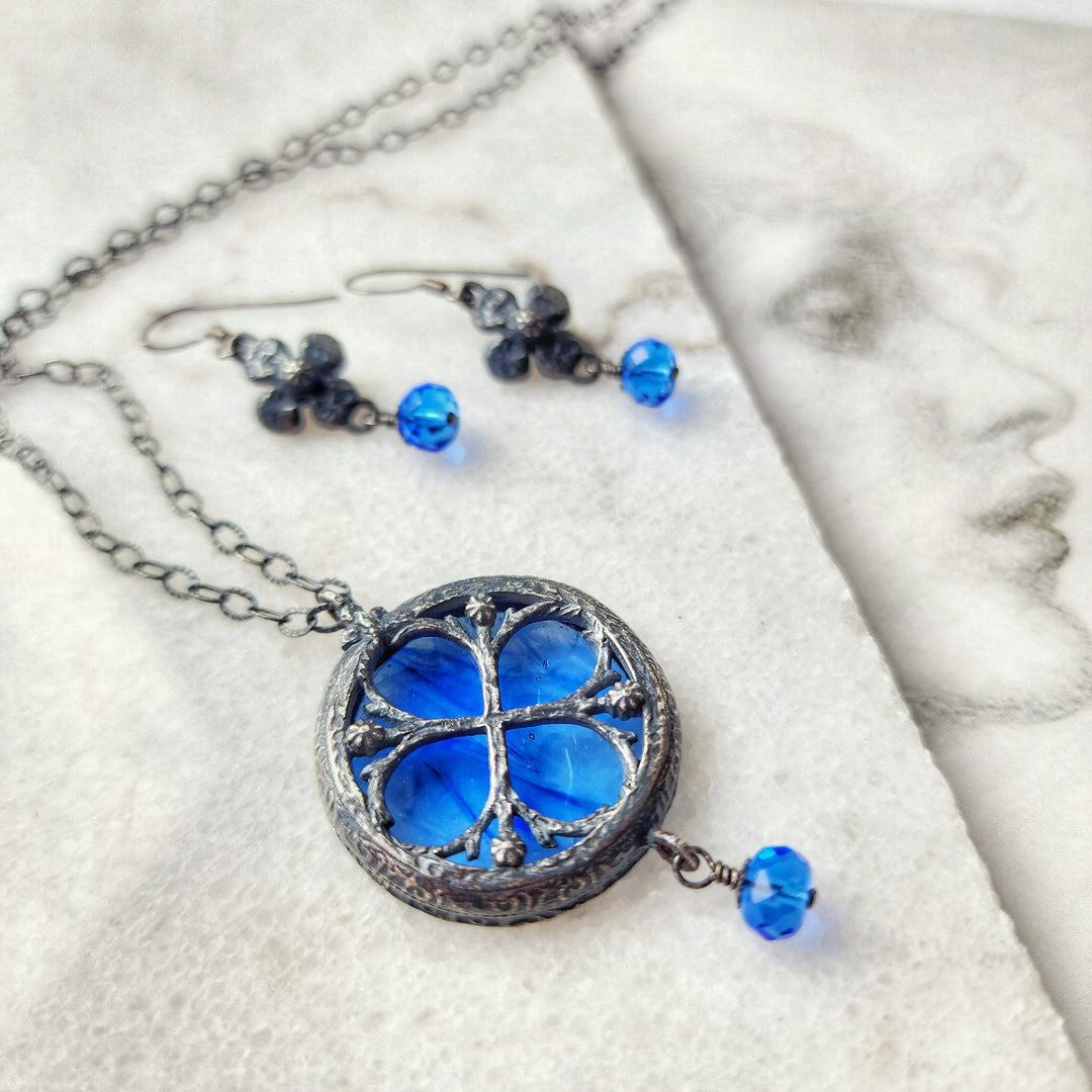 desiderium - floriated clover miracle window amulet