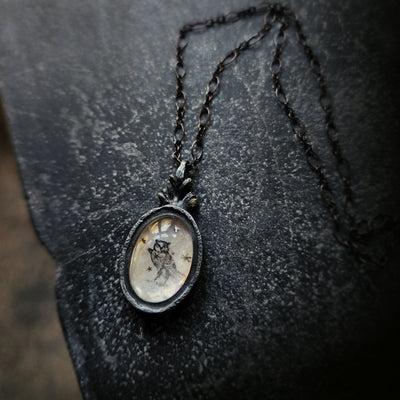 the owl amulet.