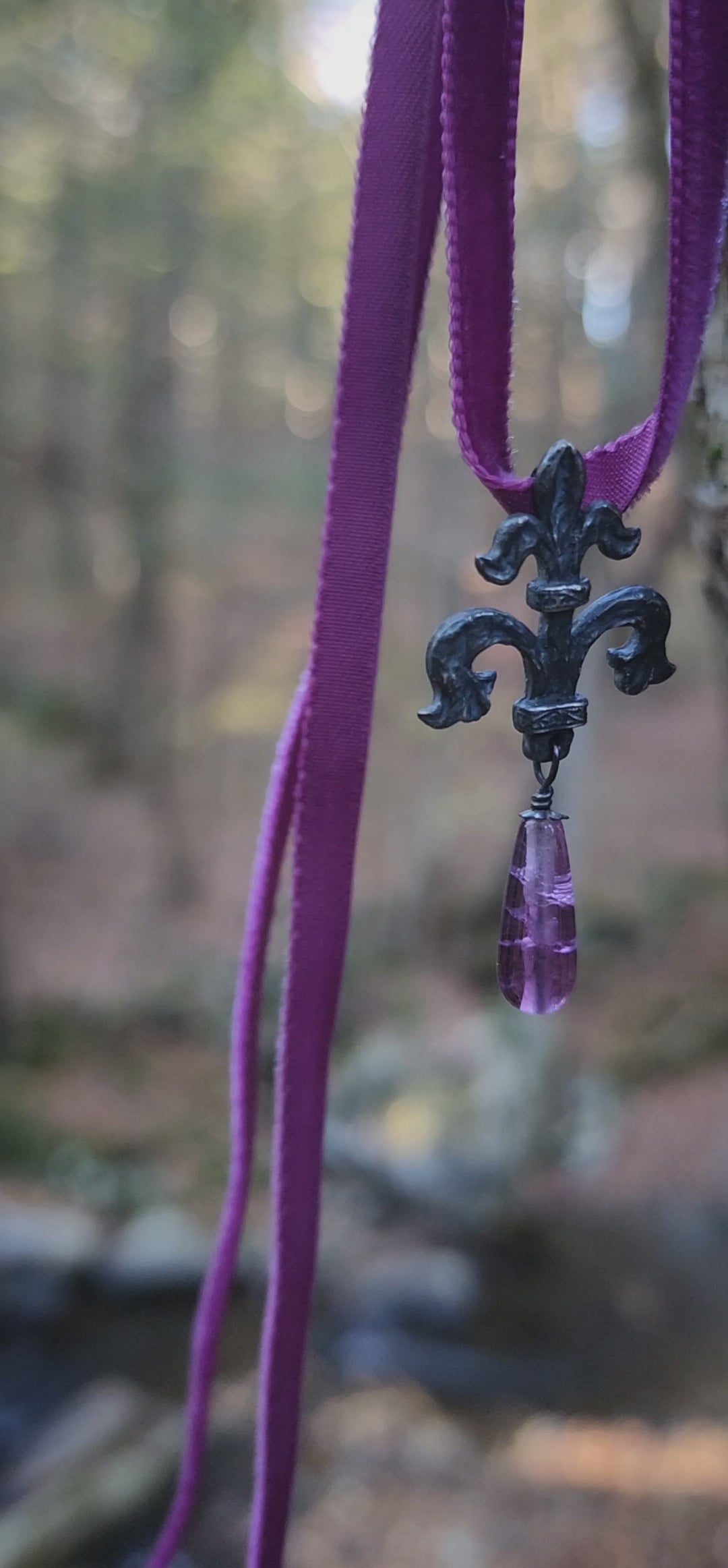 fleur de lis amulet - antiqued sterling with fluorite on velvet
