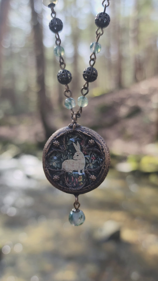 tapestry rabbit - floriated clover miracle window amulet