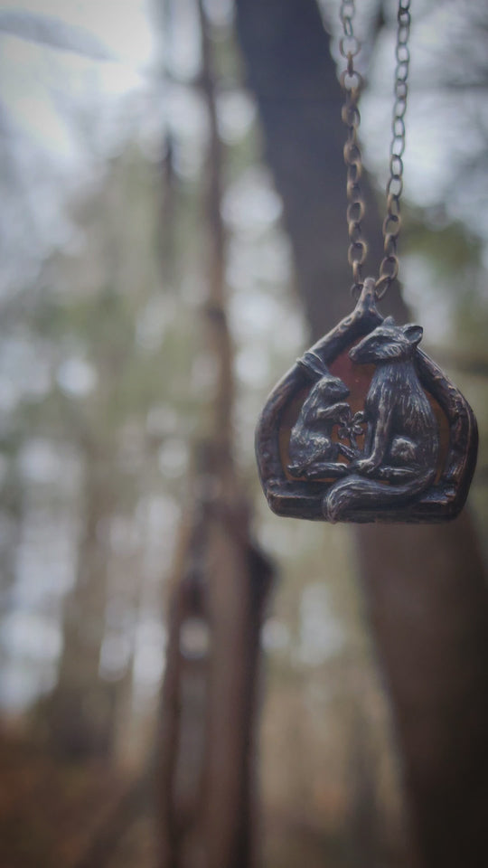 lapin, renard et fleur arch window amulet - antiqued sterling & bronze