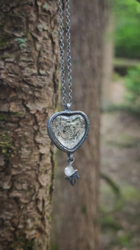 beasties & birds - pictorial heart amulet
