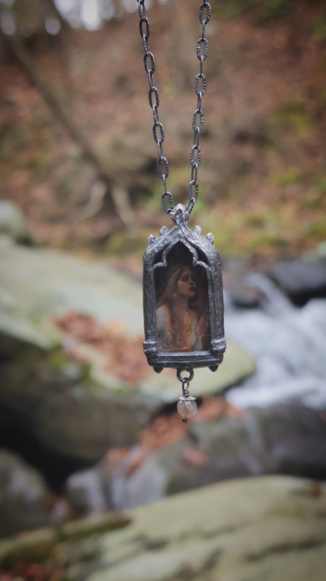 the broad stream bore her far away - venetian gothic window amulet