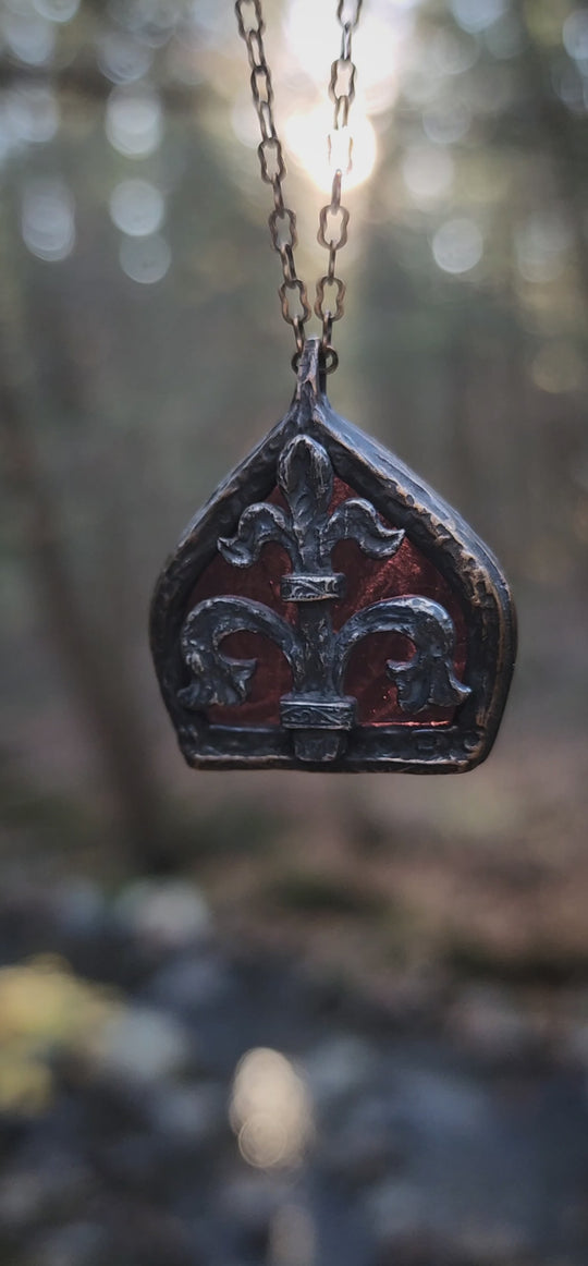 fleur de lis - garnet arch window amulet - antiqued sterling & bronze