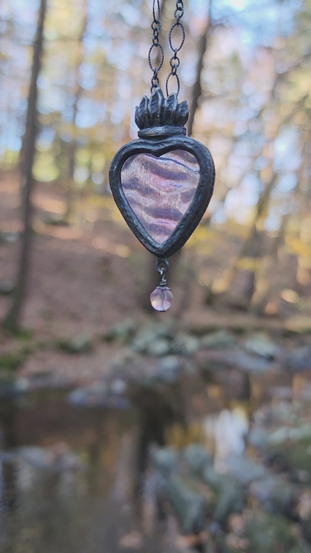 astraea - a sacred heart amulet