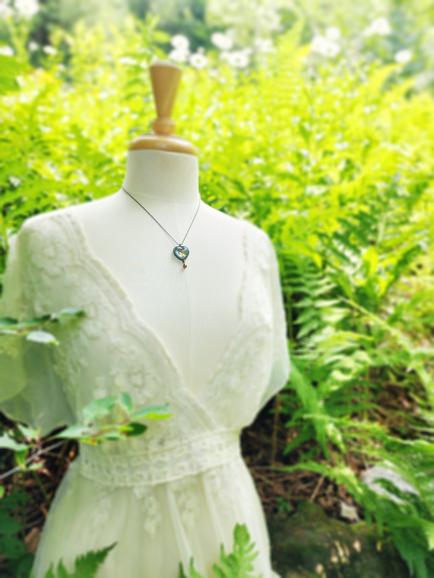 psyche entering cupid's garden - pictorial heart amulet