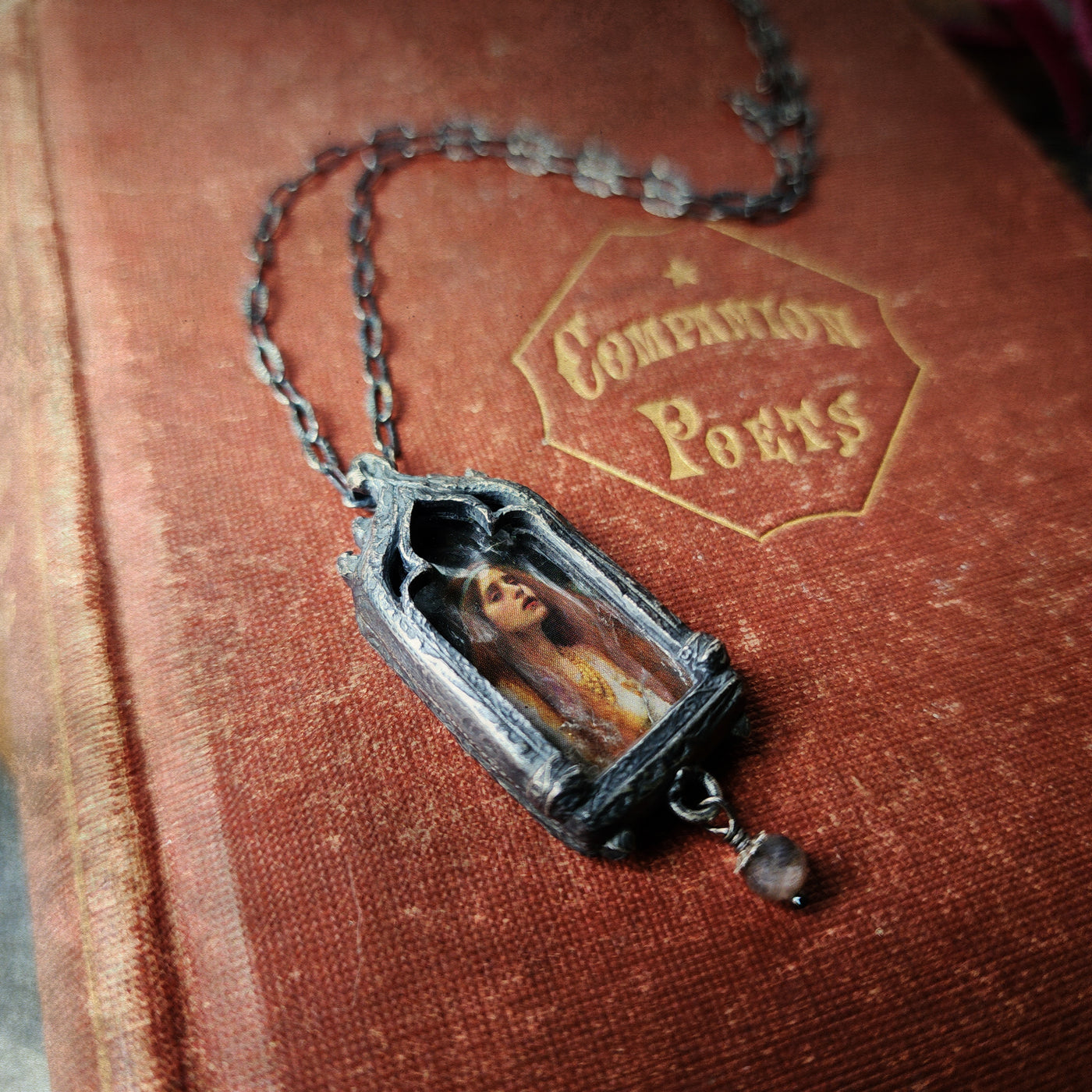 the broad stream bore her far away - venetian gothic window amulet