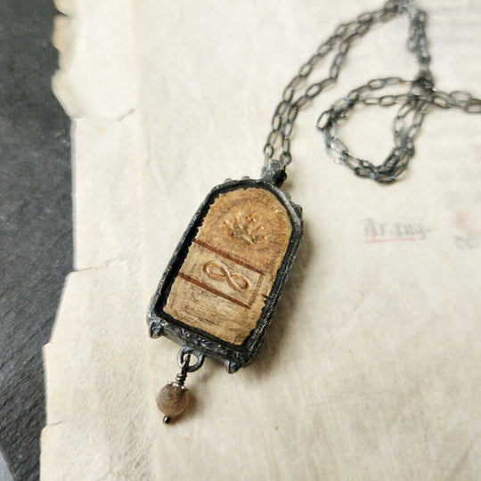 the broad stream bore her far away - venetian gothic window amulet