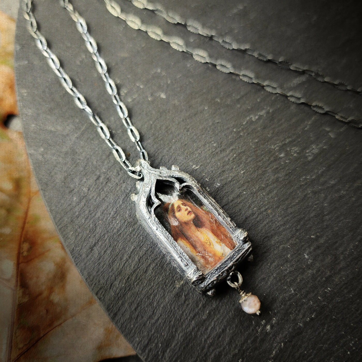 the broad stream bore her far away - venetian gothic window amulet