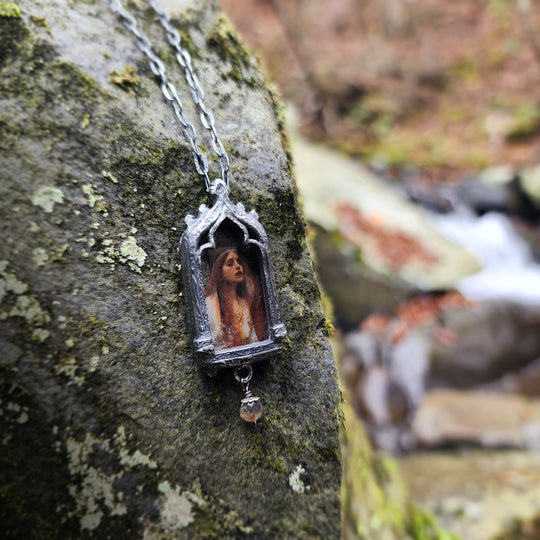 the broad stream bore her far away - venetian gothic window amulet