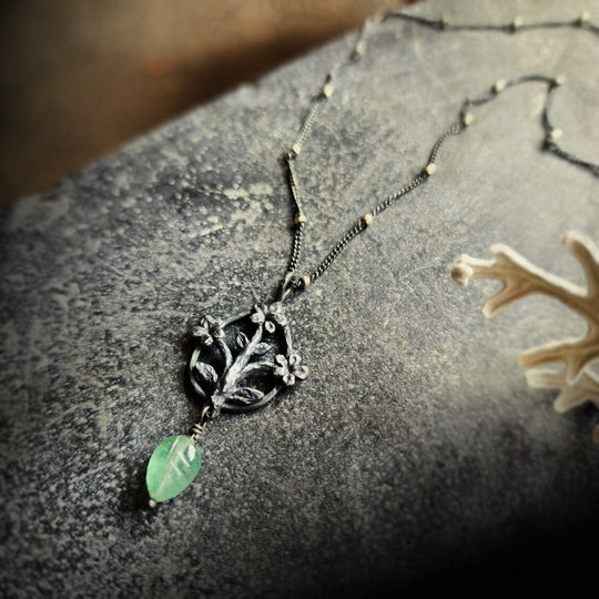 trois fleurs sacrées amulet - antiqued sterling with aventurine leaf