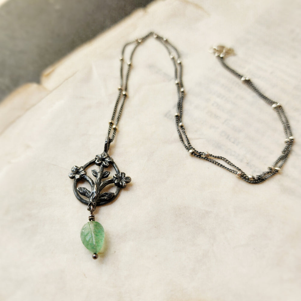 trois fleurs sacrées amulet - antiqued sterling with aventurine leaf