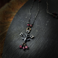 trois fleurs sacrées amulet - antiqued sterling & bronze with tourmaline