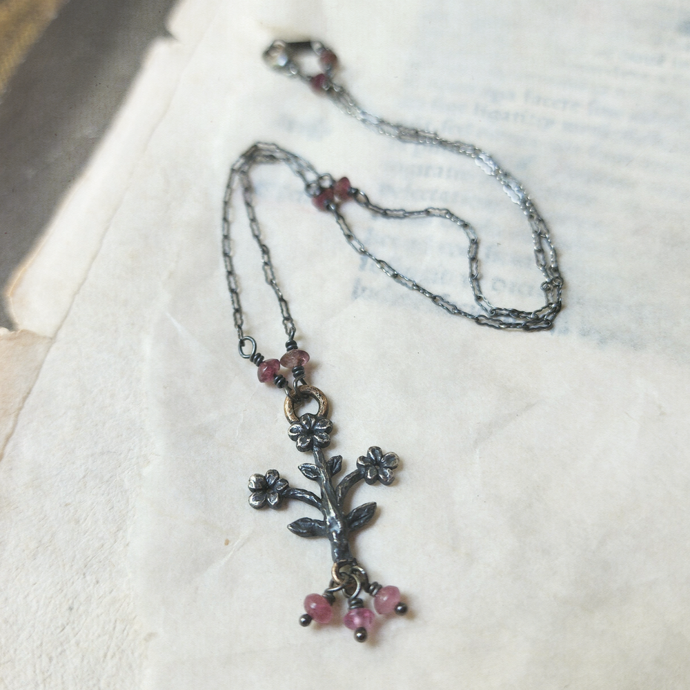 trois fleurs sacrées amulet - antiqued sterling & bronze with tourmaline