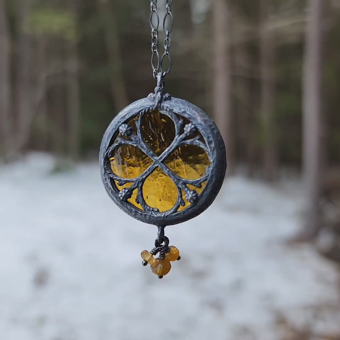 the infinity of the hive - floriated clover miracle window amulet