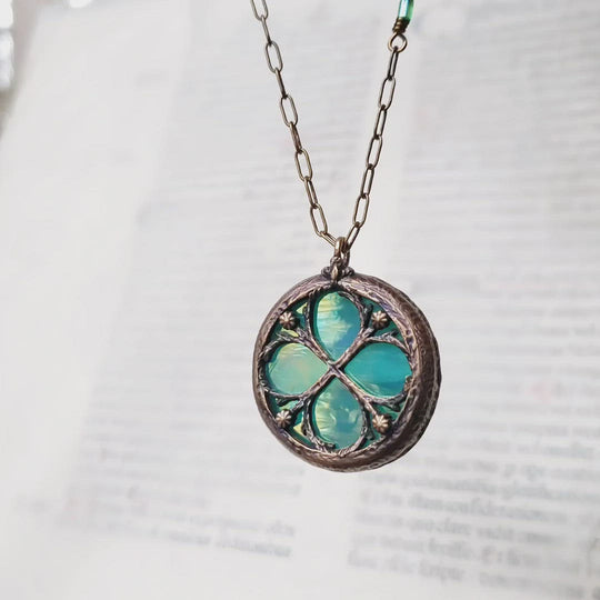 aqua vitae - floriated clover miracle window amulet