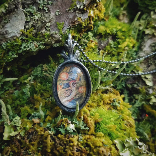 morris woodpecker tapestry amulet.