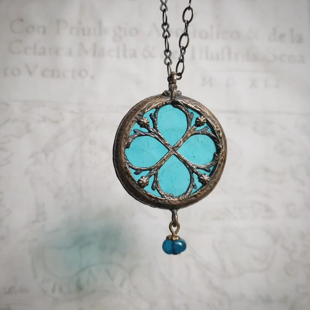 halcyon - floriated clover miracle window amulet