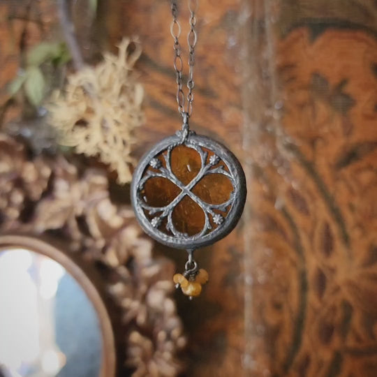the infinity of the hive - floriated clover miracle window amulet