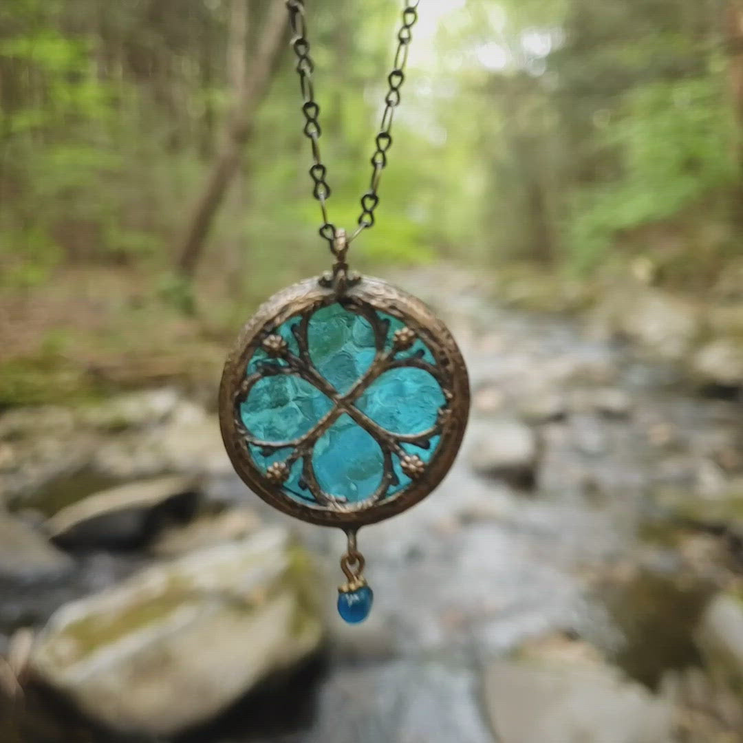 halcyon - floriated clover miracle window amulet