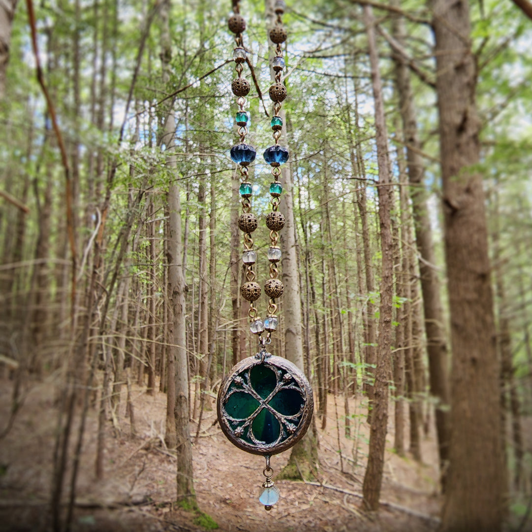 depths of the sea - floriated clover miracle window amulet